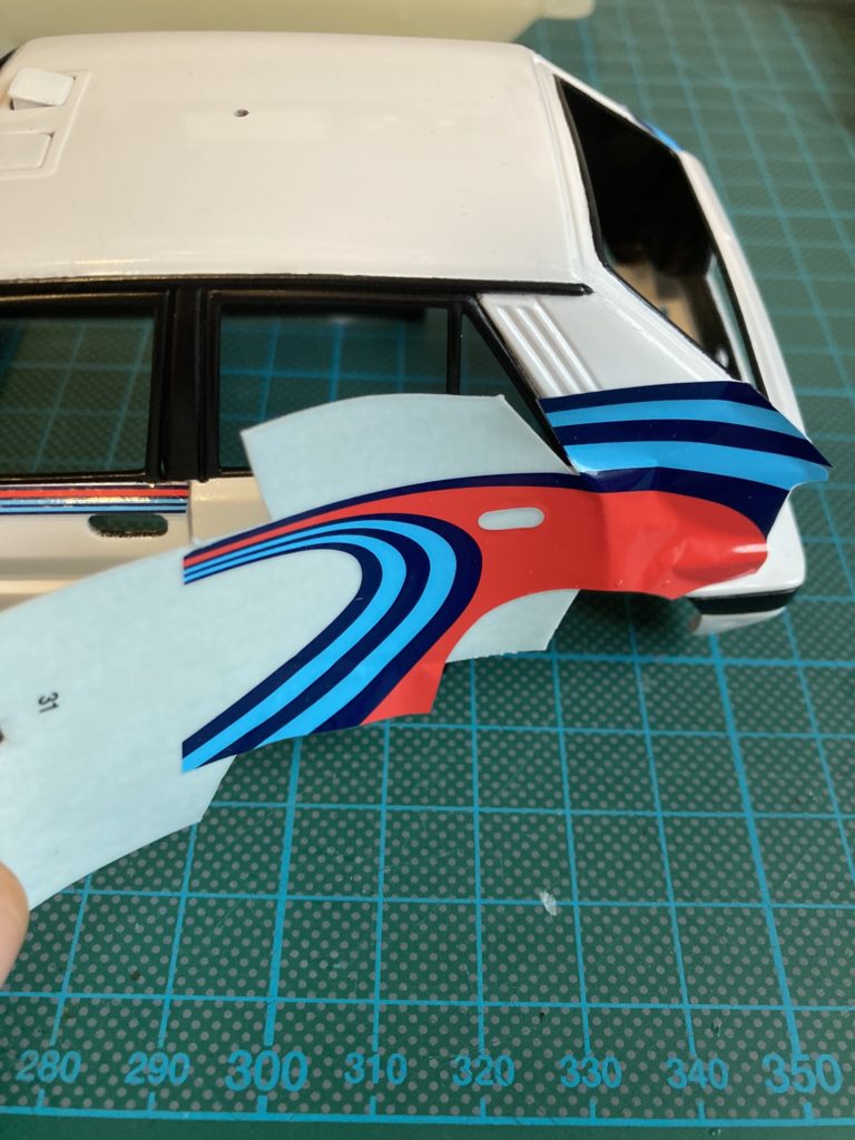 Applying a Martini stripe decal to the 1:24 Italeri Lancia Delta HF Integrale